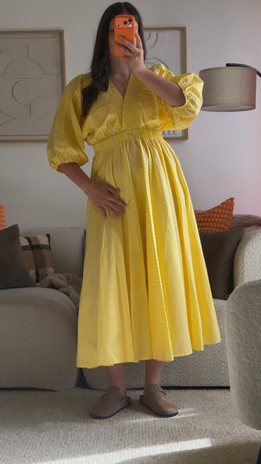 Yellow dress with pink stripes