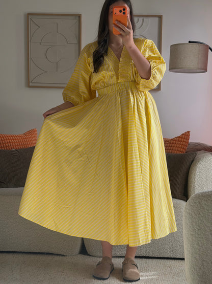 Yellow dress with pink stripes